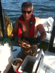 Cleaning Dungenus Crabs - Fishing Charters at BC Fishing Charters